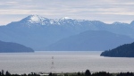 The view looking down the Douglas Channel from Kitimat, B.C. Tuesday, June, 17, 2014. Charges have now been laid against a tug and barge company in northwestern British Columbia and a senior company official two years after a tug sank south of Kitimat, killing the captain and one crew member. THE CANADIAN PRESS/Jonathan Hayward