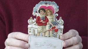This image shows a Valentine’s Day card from 1917, given to Louise Wirt by Fred Roth when he was in the fourth grade. The couple married years later and the card remained near Louise's bedside until her death at 91. (Nancy Roth via AP)