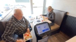 Hockey Sushi started employing a robot waiter during the COVID-19 pandemic. It's been such a hit that they're keeping it. (Dave Charbonneau/CTV News Ottawa)