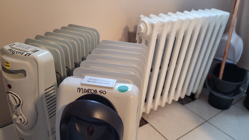 Jorden Arsenualt, a tenant living inside 524 Pitt St. W., says Marda Management supplied him with these heaters after the heat went out in March 2022. He says they were not adequate and wants Marda to cover the costs of a separate heater he paid for out of pocket. (Sanjay Maru/CTV News Windsor)