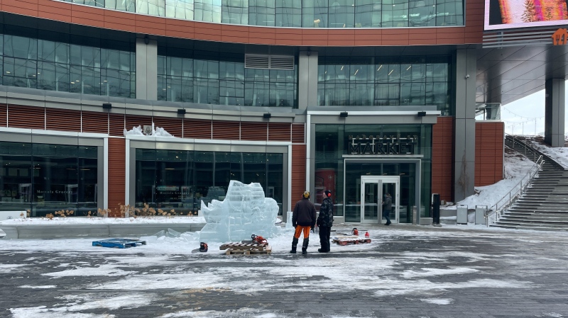 Ice carvers work on ice sculptures in downtown Winnipeg on Feb 8, 2023, as a part of Downtown Winnipeg BIZ's Winter Wanderland. (Source: Jamie Dowsett/CTV News Winnipeg)