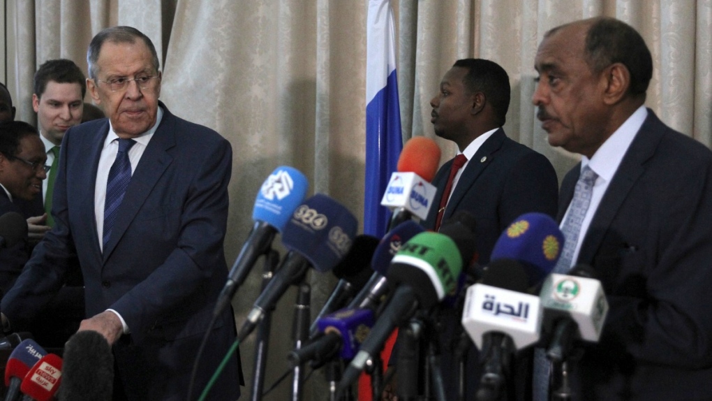 Russian FM Sergei Lavrov, left, in Khartoum