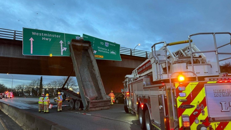 The driver of a commercial truck that collided with an overpass in Richmond Friday morning has not been co-operating with investigators, according to the local RCMP detachment. (@RichmondRCMP/Twitter)
