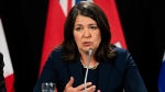 Alberta Premier Danielle Smith speaks to members of the media during a press conference in Ottawa, on Tuesday, Feb. 7, 2023. THE CANADIAN PRESS/Spencer Colby