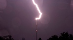 Lightning strikes the CN Tower during a fierce storm in Toronto Wednesday, August 24, 2011. THE CANADIAN PRESS/Darren Calabrese