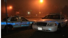 Peel Regional Police are parked in front of a home in Brampton where a shooting took place on Jan. 24, 2010.