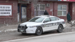 A Winnipeg police cruiser is seen parked on Main Street on March 10, 2023. Winnipeg police are investigating a man's death at the Manwin Hotel on Main Street on March 9, 2023 as suspicious. (Image source: Glenn Pismenny/CTV News Winnipeg)