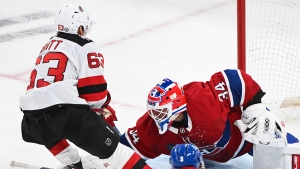 Montreal Canadiens goaltender Jake Allen stops New Jersey Devils' Jesper Bratt during third period NHL hockey action in Montreal, Saturday, March 11, 2023. THE CANADIAN PRESS/Graham Hughes