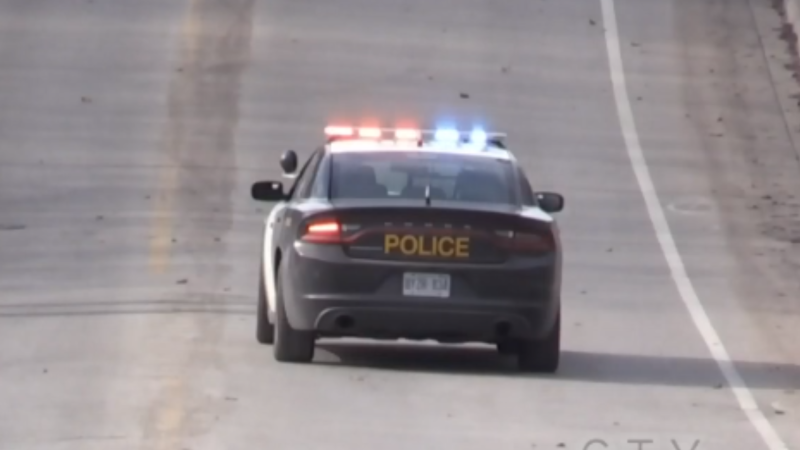An Ontario Provincial Police cruiser is pictured with lights flashing - file image. (CTV News Barrie)