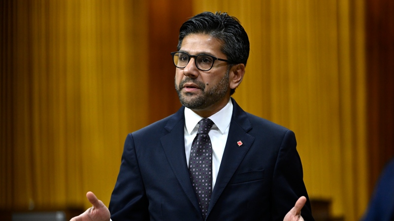 Ottawa MP Yasir Naqvi has stepped down from his role as a parliamentary secretary in order to possibly run for leadership of the provincial Liberals. Naqvi rises during Question Period in the House of Commons on Parliament Hill in Ottawa on Friday, Dec. 9, 2022. THE CANADIAN PRESS/Justin Tang