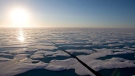The midnight sun shines over the ice covered waters near Resolute bay at 1:30am as seen from the Canadian Coast Guard icebreaker Louis S. St-Laurent Saturday, July 12, 2008. (THE CANADIAN PRESS/Jonathan Hayward)