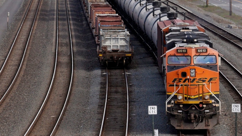 In this July 27, 2015, file photo, a BNSF Railway Company train is parked in Seattle. (AP Photo/Elaine Thompson, File)