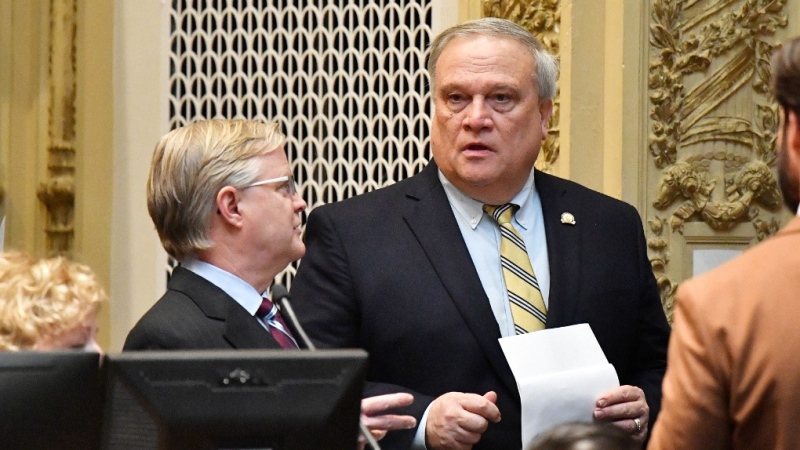 Kentucky State Senate President Robert Stivers, right speaks with Senate Majority Floor Leader Damon Thayer during a recess at the Kentucky State Capitol in Frankfort, Ky., Thursday, March 16, 2023. (AP Photo/Timothy D. Easley)