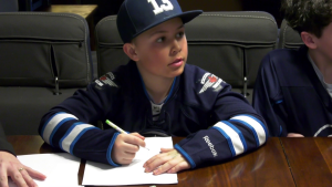 Charlie Berg, 9, has been drawing pictures of Winnipeg Jets players to help a schoolmate dealing with medical procedures. (CTV News Photo Michael D'Alimonte)