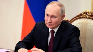 Russian President Vladimir Putin speaks during a meeting with Vladislav Kuznetsov, new appointed acting Governor of the Chukotka Autonomous region via a videoconference at the Kremlin in Moscow, Russia, Wednesday, March 15, 2023. (Mikhail Metzel, Sputnik, Kremlin Pool Photo via AP)
