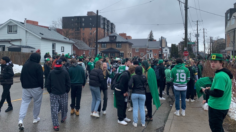 St. Patrick's Day revellers are seen on Marshall Street in Waterloo on St. Patrick's Day 2023. (Krista Simpson/CTV Kitchener)