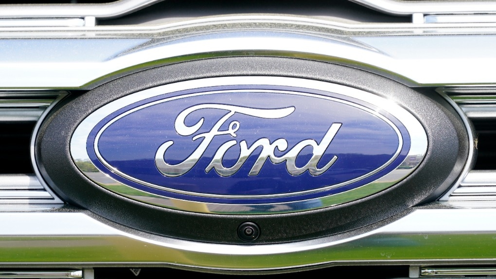 A logo on a vehicle at a Ford dealership