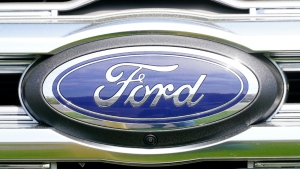 A logo on a vehicle at a Ford dealership in Springfield, Pa., Tuesday, April 26, 2022. (AP Photo/Matt Rourke, File)