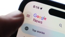 The Google News homepage is displayed on an iPhone in Ottawa on Tuesday, Feb. 28, 2023. THE CANADIAN PRESS/Sean Kilpatrick