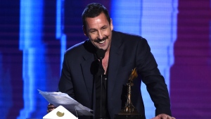 Adam Sandler accepts the award for best male lead for "Uncut Gems" at the 35th Film Independent Spirit Awards on Feb. 8, 2020, in Santa Monica, Calif. Sandler will be honoured by a host of comedic and entertainment royalty March 19, 2023, as he receives the Kennedy Center's Mark Twain Prize for American Humor. (AP Photo/Chris Pizzello, File)