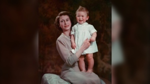 A young King Charles is seen in the lap of his mother, the late Queen Elizabeth II, in this photo shared on the Royal Family’s official Twitter account. (The Royal Family / Twitter)