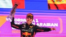 Red Bull driver Sergio Perez of Mexico celebrates after winning the Saudi Arabia Formula One Grand Prix at the Jeddah corniche circuit in Jeddah, Saudi Arabia, Sunday, March 19, 2023. (AP Photo/Hassan Ammar)