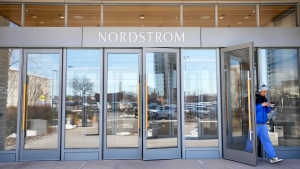 People enter a Nordstrom department store at Sherway Gardens in Toronto on Thursday, March 9, 2023. THE CANADIAN PRESS/Nathan Denette
