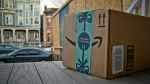 This image taken from video shows an Amazon package on the porch of a Jersey City, N.J. residence after its delivery Tuesday, Dec. 11, 2018. (AP / Robert Bumsted)