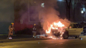 FIre crews responded to a collision in South Vancouver early Monday, March 20, after a white SUV was enfulfed in flames. Police closed the intersection at Kingsway and Tyne Street to investigate. 