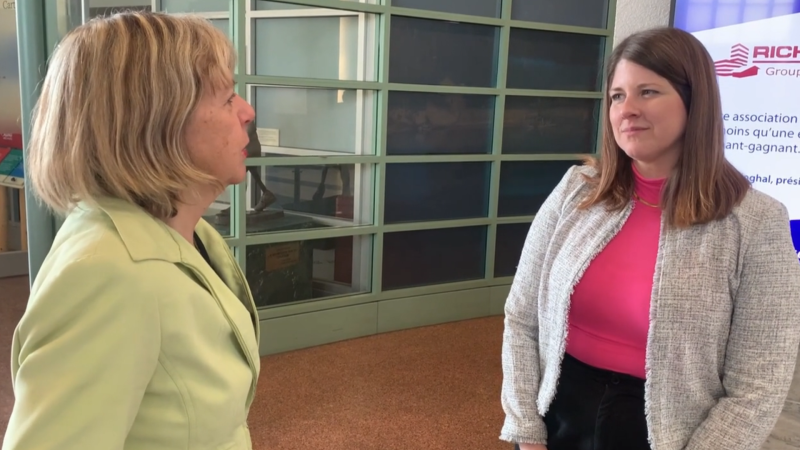 Ottawa Board of Health member Elyse Banham (right) speaks with Ottawa city councillor Theresa Kavanagh, the council liaison on women and gender equity. March 20, 2023. (Jackie Perez/CTV News Ottawa)
