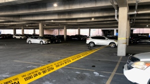 Police tape in the parking lot at Fairview Mall after a shooting sent several people to hospital on March 20, 2023 (CTV News Toronto/ Beth Macdonell). 