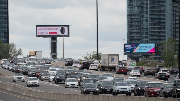 Vehicles drive along the Gardiner Expressway in Toronto at the start of the May long weekend on Saturday, May 22, 2021. THE CANADIAN PRESS/Tijana Martin