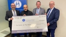 Left to Right: Spiro Bonis Chairperson, An Evening in Greece, Dino Sophocleous, president at CEO of HRF, Minister Don McMorris, Thomas Siarkos, Memories Dining & Bar. (Gareth Dillistone / CTV News)