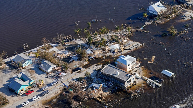 The bridge leading from Fort Myers to Pine Island, Fla., is seen heavily damaged in the aftermath of Hurricane Ian on Pine Island, Fla., Oct. 1, 2022. (AP Photo/Gerald Herbert, File) 