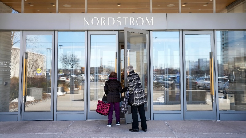 People enter a Nordstrom department store at Sherway Gardens in Toronto, March 9, 2023. THE CANADIAN PRESS/Nathan Denette