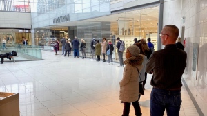 Shoppers line up outside Nordstrom at the Rideau Centre on Tuesday, March 21, 2023. (CTV News Ottawa)