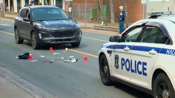 Police investigate a scene where a vehicle hit a pedestrian in Halifax on March 21, 2023. (Paul Dewitt/CTV) 
