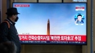 A TV screen is seen reporting North Korea's missile launch during a news program at the Seoul Railway Station in Seoul, South Korea, March 22, 2023. (AP Photo/Lee Jin-man)