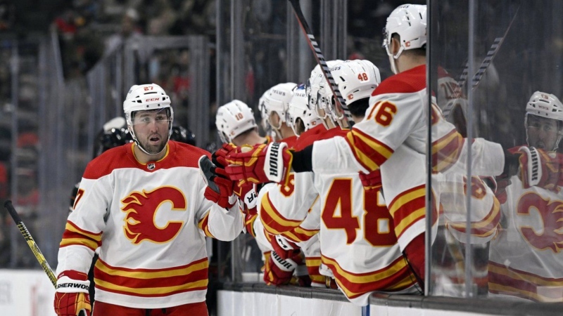 Calgary Flames Nick Ritchie celebrates with teammates after scoring against the Anaheim Ducks in Anaheim, Calif., on March 21. (AP Photo/Alex Gallardo)