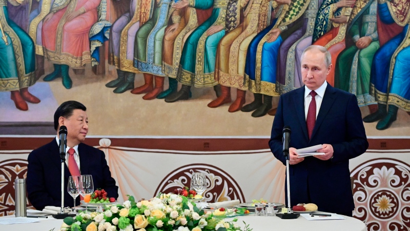 Russian President Vladimir Putin, right, delivers his speech as Chinese President Xi Jinping listens to him during their dinner at The Palace of the Facets in the Moscow Kremlin, March 21, 2023. (Pavel Byrkin, Sputnik, Kremlin Pool Photo via AP)