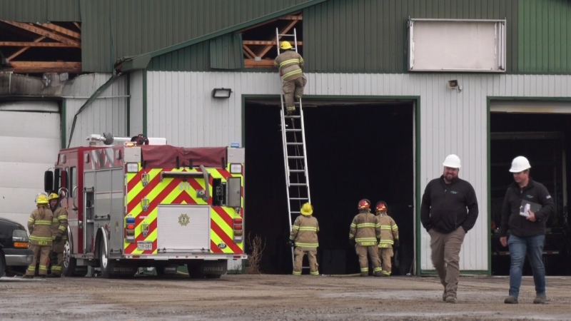 Crews respond to a fire at a commercial building in Paris, Ont. on March 22, 2023. (Krista Sharpe/CTV Kitchener)