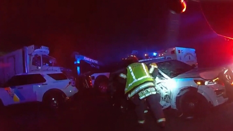 Speeding semi-truck crashes into police cars