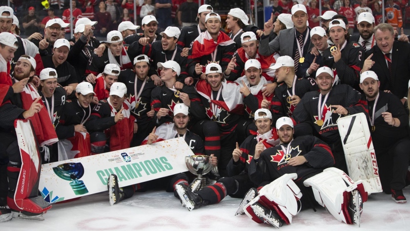 Canada celebrates the win over Finland in the IIHF World Junior Hockey Championship gold-medal game in Edmonton on Aug. 20, 2022. THE CANADIAN PRESS/Jason Franson