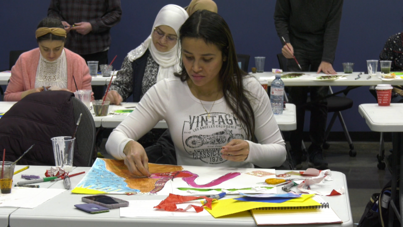 Jissell Munguia works on an art piece at Alberta Council for the Ukrainian Arts on March 22, 2023.