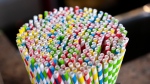 Paper straws are seen at a market in Montreal on Thursday, June 13, 2019. Canada's ban on the manufacture and import for sale of some plastic items, including grocery bags and straws, has taken effect.THE CANADIAN PRESS/Paul Chiasson