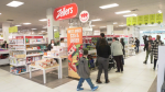 Customers roam Zellers on the day it opened in Edmonton's Kingsway Mall on March 23, 2023. 