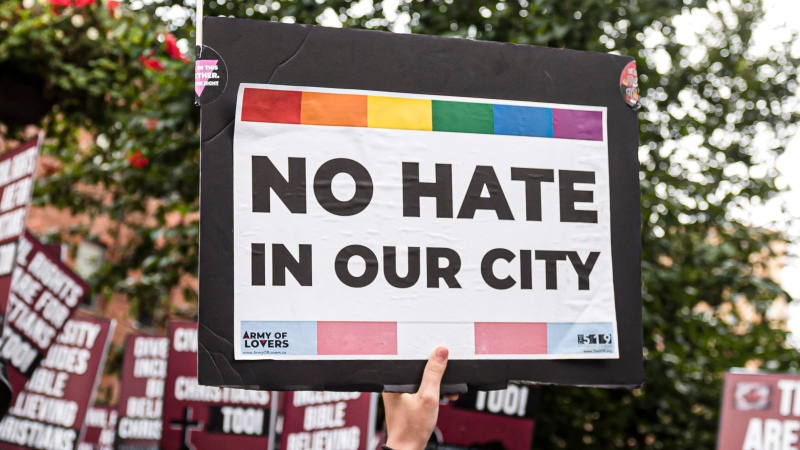 Anti-LGBTQ Christian free speech activists are met by counter protesters supporting the city's gay community, in Toronto, on Saturday, Sept., 28, 2019. THE CANADIAN PRESS/Christopher Katsarov