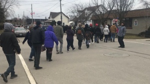 People line up for the 'Catch the Ace' lottery in Hagersville, Ont. (March 23, 2023)