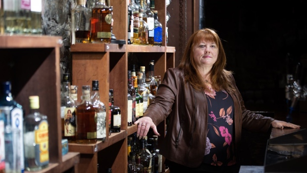 Brenda O'Reilly, the owner of multiple bars and restaurants in St. John's, poses for a picture in her pub, Yellowbelly Brewery, on Sunday, March 5, 2023. (THE CANADIAN PRESS/ Paul Daly)