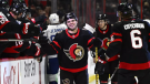 Ottawa Senators right wing Alex DeBrincat (12) celebrates after his second goal against the Tampa Bay Lightning with teammates during first-period NHL hockey game action in Ottawa, Thursday, March 23, 2023. (Justin Tang/The Canadian Press)